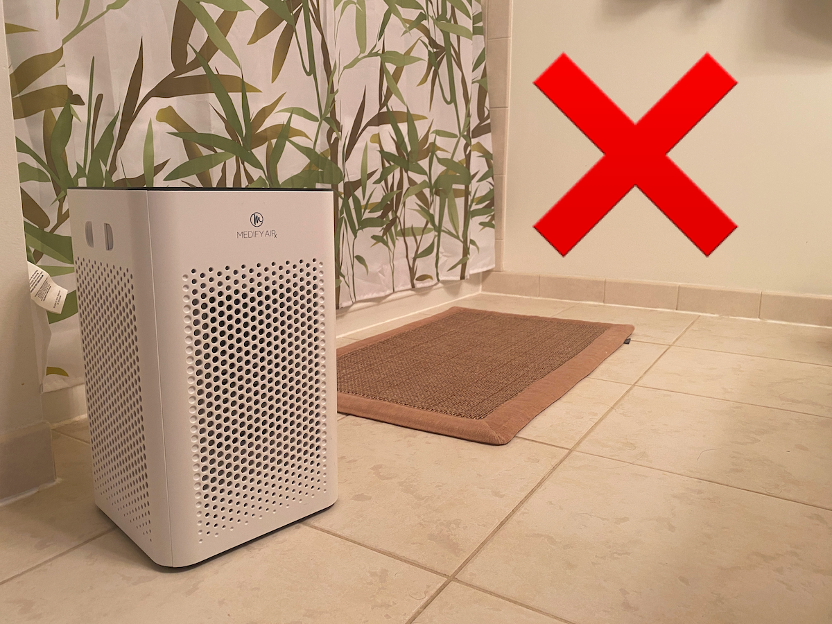 A Medify MA-25 air purifier in a bathroom.